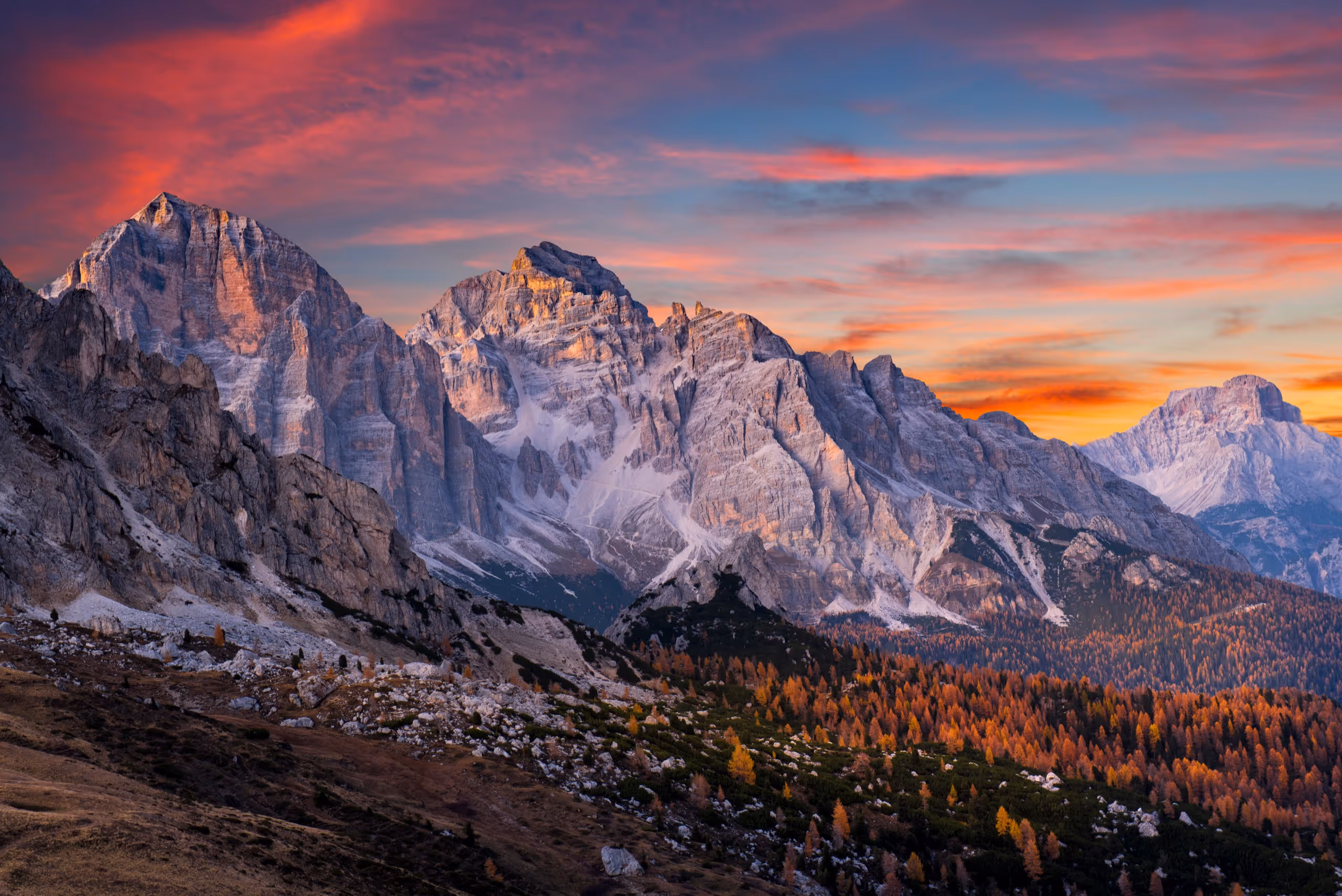 Jagged alpine peaks under a fiery sunset over Amelia County, Idaho.